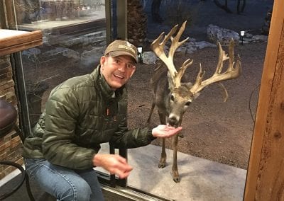 feeding deer at lodge